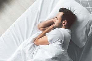 man sleeping - Copyright – Stock Photo / Register Mark