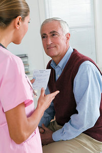 nurse with patient - Copyright – Stock Photo / Register Mark