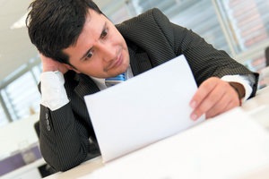 slouched sitting - Copyright – Stock Photo / Register Mark