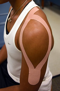 shoulder taping - Copyright – Stock Photo / Register Mark